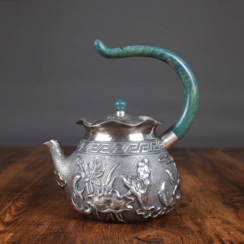 李福明:从匠人到品牌的银壶艺术之旅