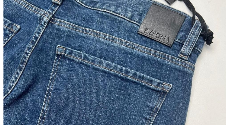 牛仔裤后面的皮标用途