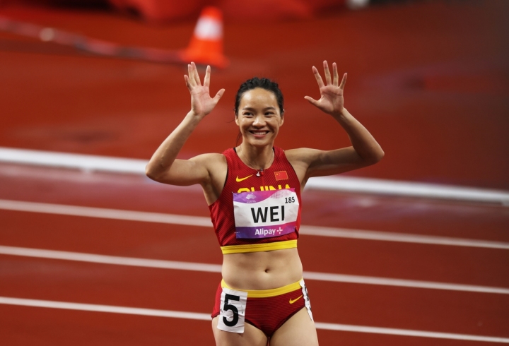 田径女子100米预赛 中国选手韦永丽11秒35晋级决赛(组图)