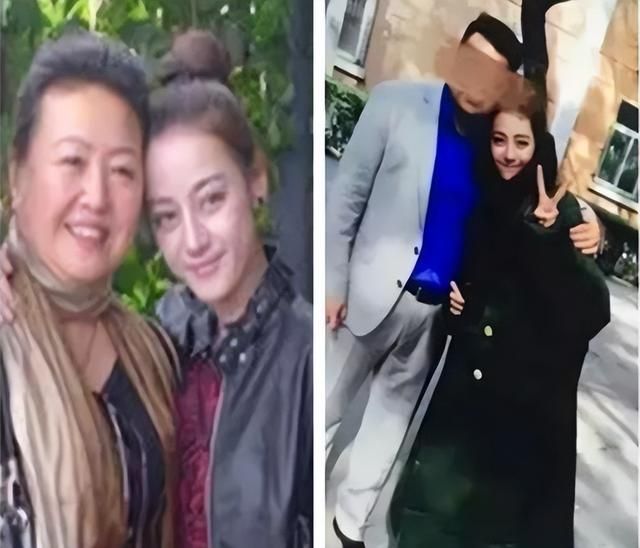 迪丽热巴爸爸参加活动,和美女亲切合影,身材高大方圆脸不像热巴