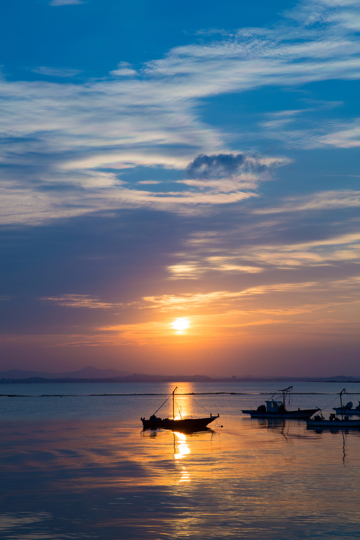 日落京畿道省船只渔船风景摄影图