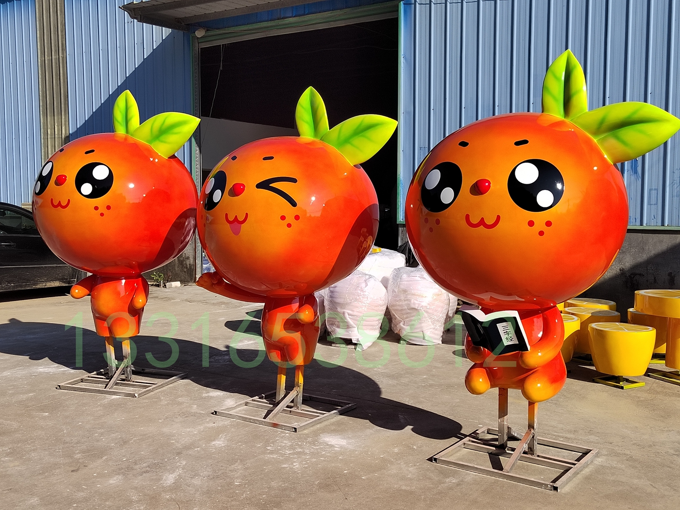 上画上水晶晶的大眼睛玻璃钢卡通橘子娃娃雕塑