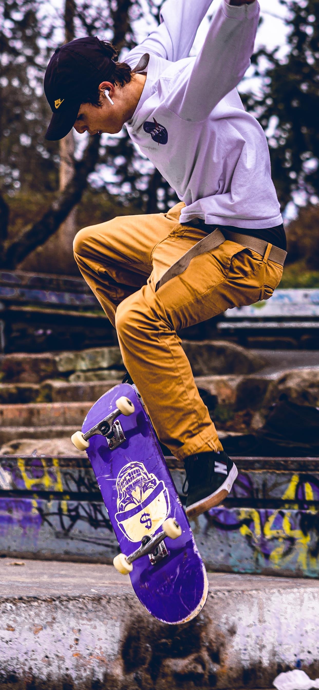 滑板少年摄影图片手机壁纸