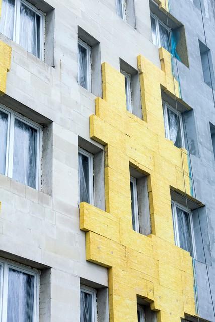 墙外的魔法:为何外墙保温是房子的必备盔甲?