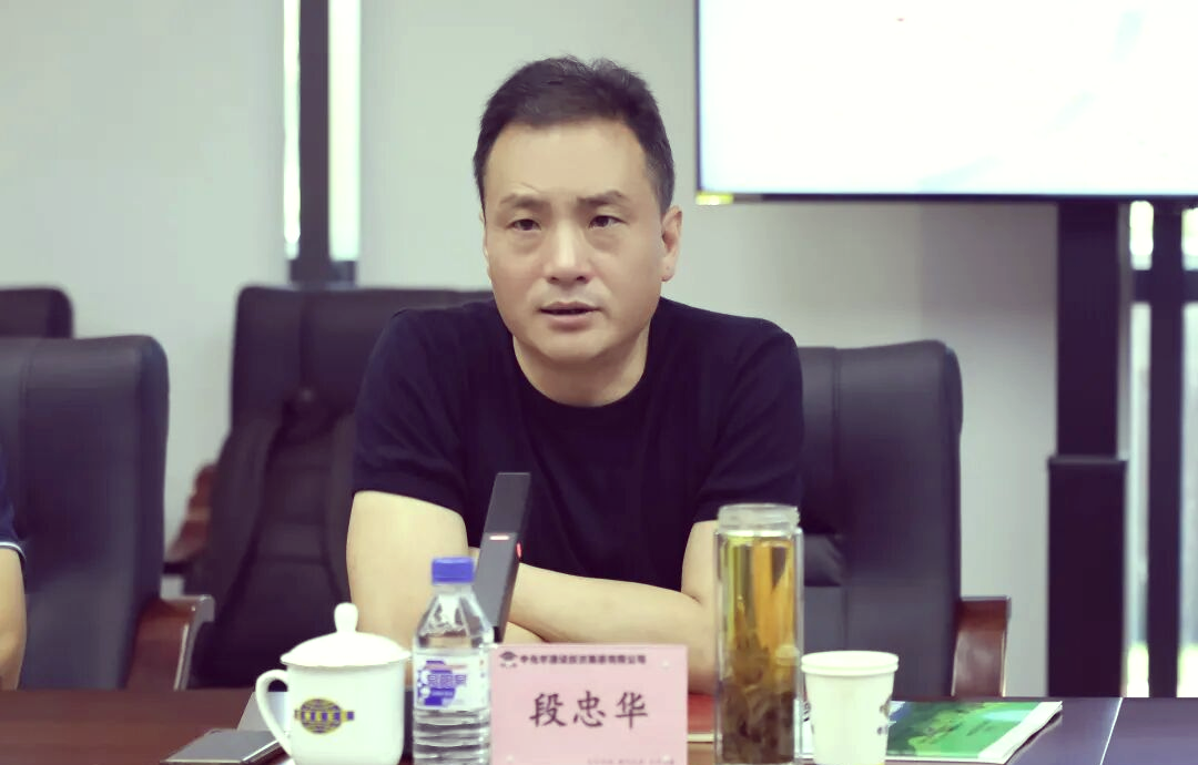 郑江与段忠华共探绿色发展新机遇,携手共创合作新篇章