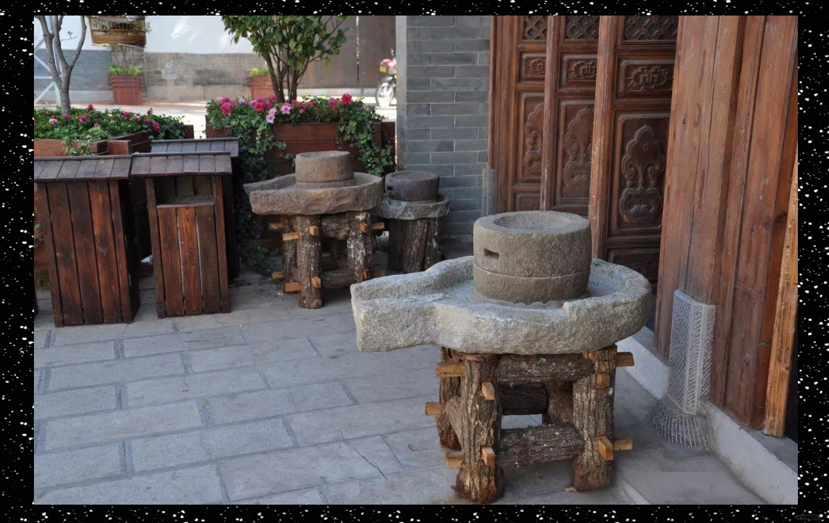 石磨重焕生机,成庭院新景致