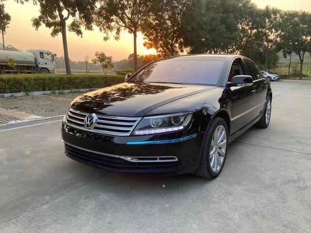 辉腾,辉腾百公里多少油就是w12 60的就是说97号油