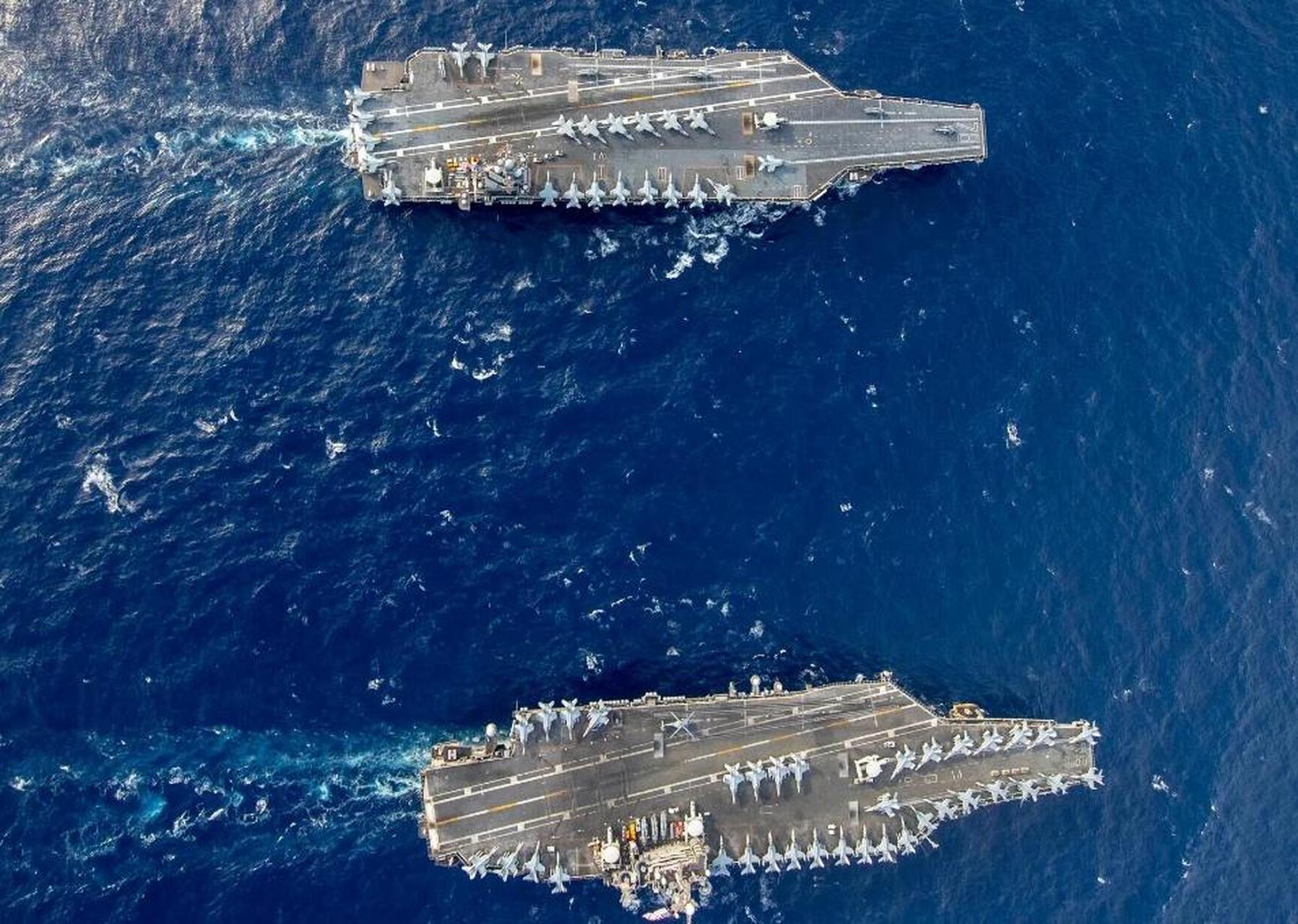 美国的两艘航空母舰已经部署在中东,按照美国的军事理念,一艘航空母舰