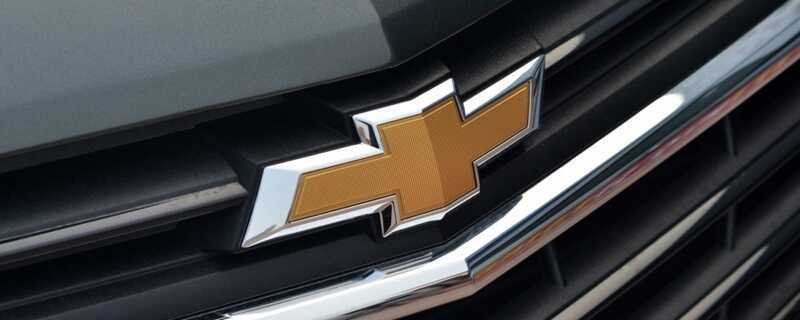 红色十字绿色龙的车标是什么车