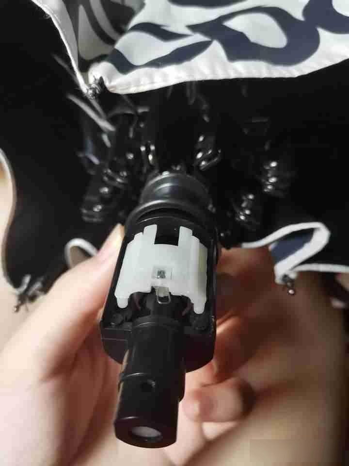 自动伞按钮按不了,这怎么修?