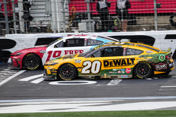1 of 5 | Chase Briscoe (19) beats Christopher Bell (20) to the finish line to win a NASCAR Cup Series auto race, Sunday, Oct. 11, 2026, in Concord, N.C. (AP Photo/Matt Kelley) License this photo