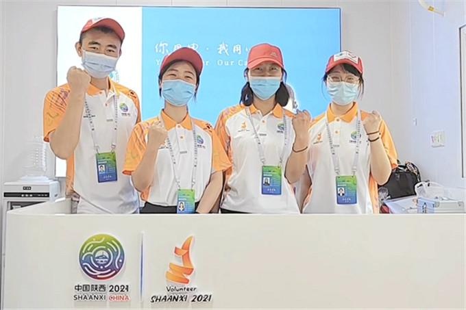 不忘初心 传递梦想:国网汉中供电公司员工及亲属共同为十四运助力加油