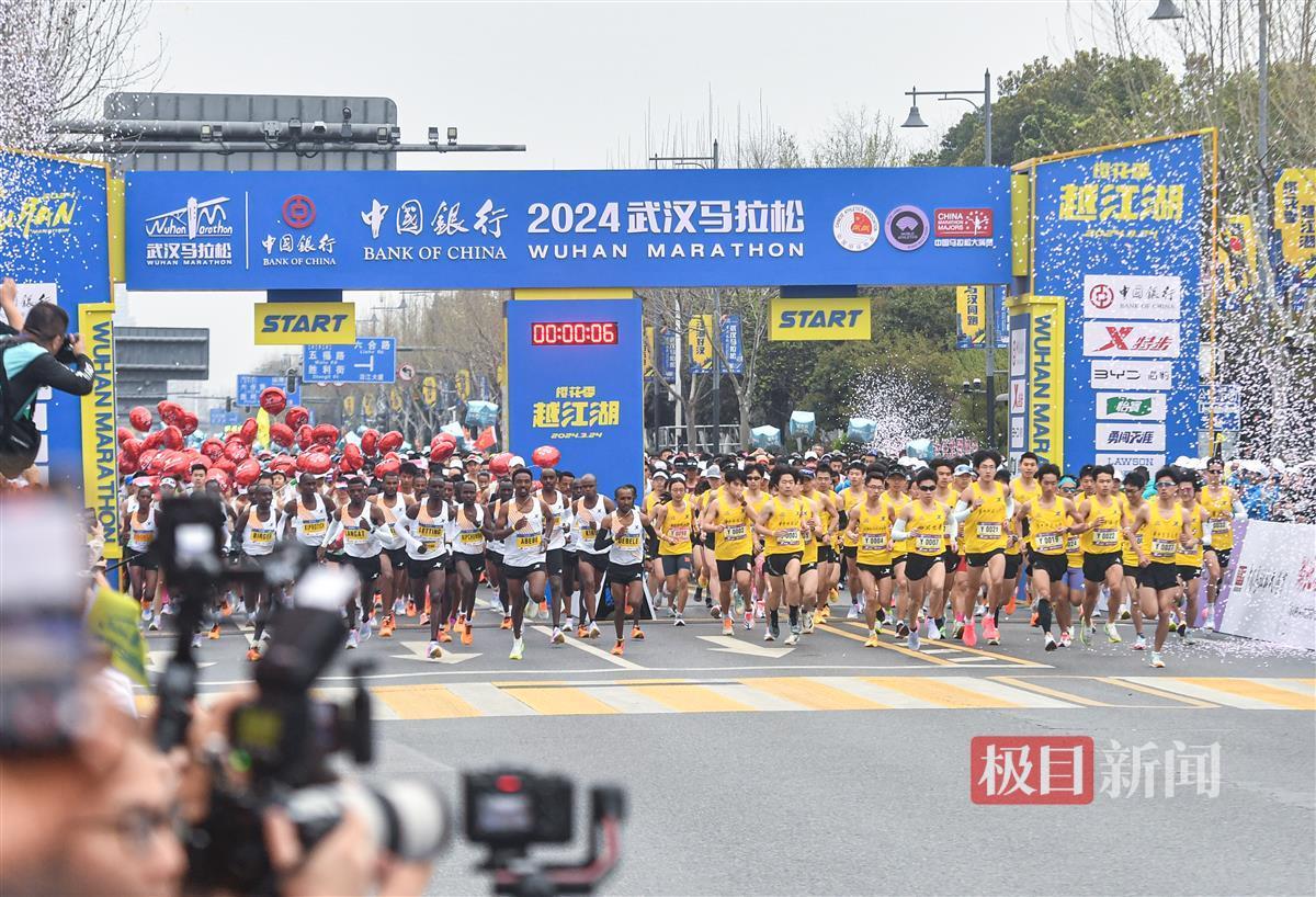 汉马两项赛会纪录被破三万跑友跑进武汉的春天里