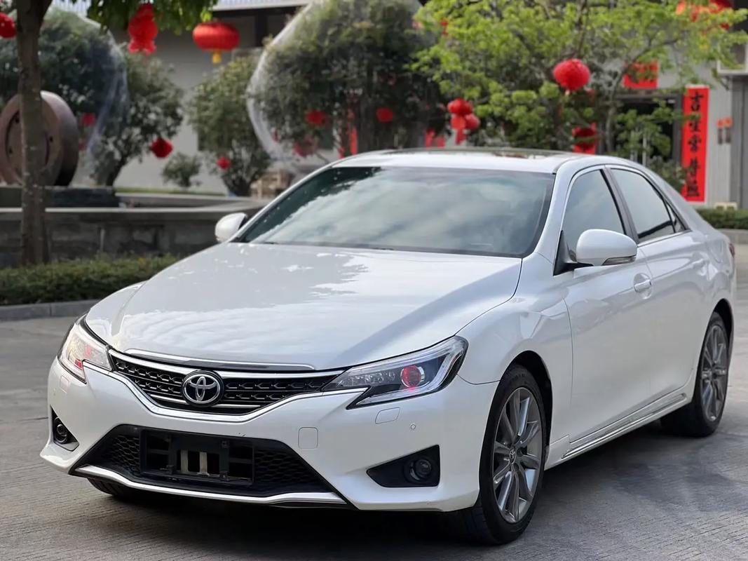 一个x的车标是什么车