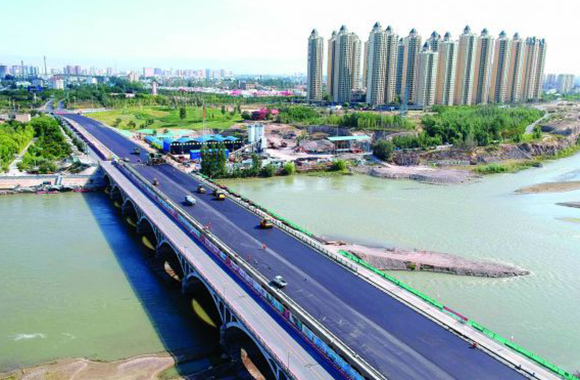 「建筑界」九跨空腹式板拱桥伊犁河大桥新一桥通车在即