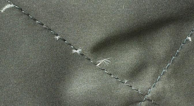 羽绒服钻毛怎么办?只需两招就能经松解决