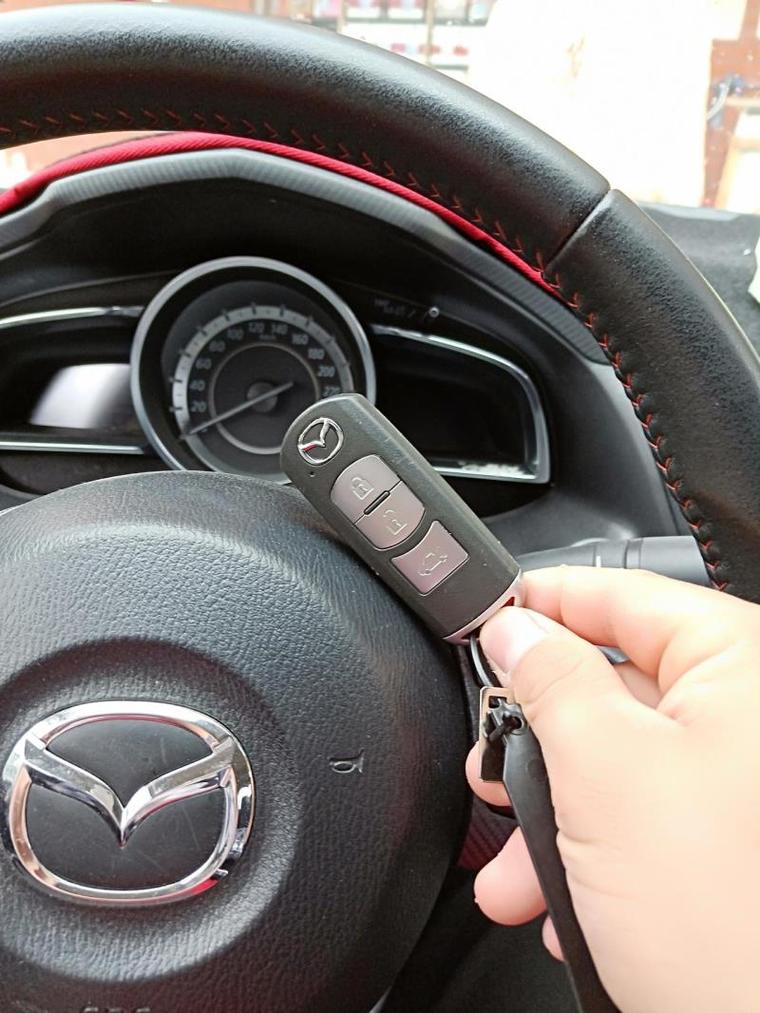 马自达3遥控钥匙开窗方法是什么?