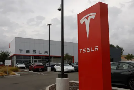 A Tesla dealership in Santa Clarita, California. Wall Street has projected Tesla to report $27.9bn in revenues.  Photograph: Justin Sullivan/Getty Images
