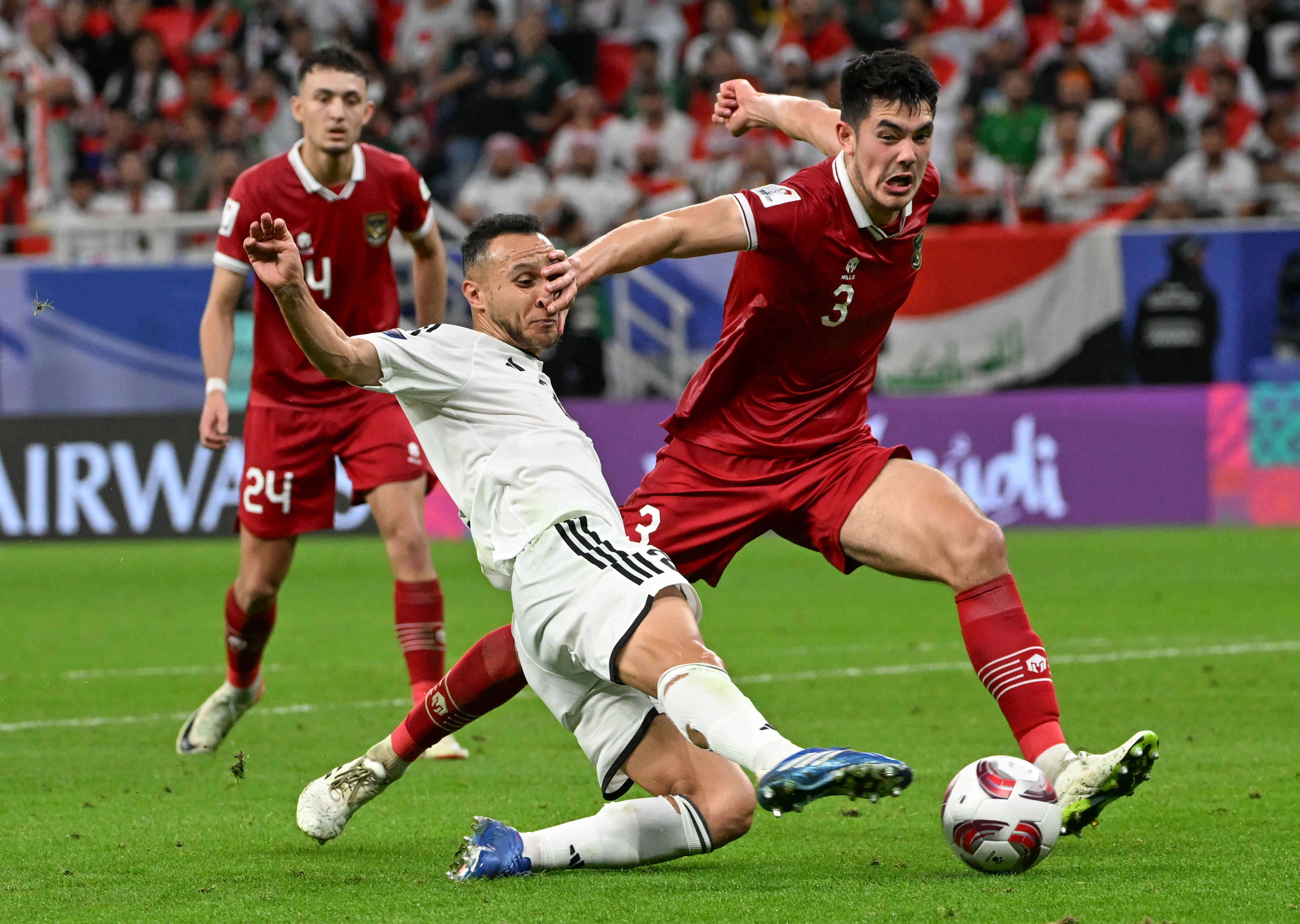 足球——小组赛d组:伊拉克队胜印度尼西亚队