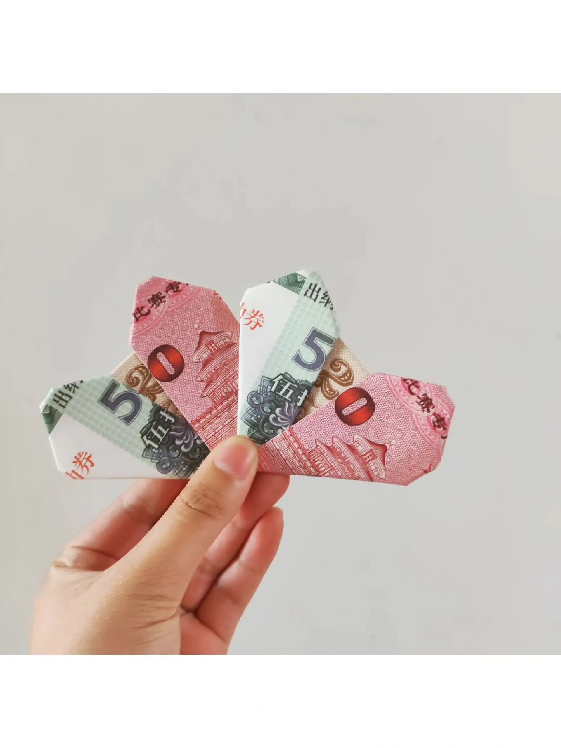 爱心折纸步骤图人民币图片