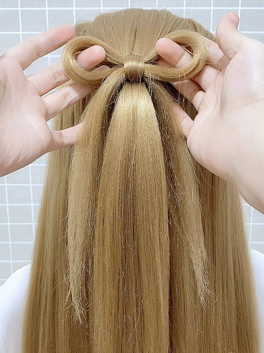 以简单的方法教你们用头发做蝴蝶结