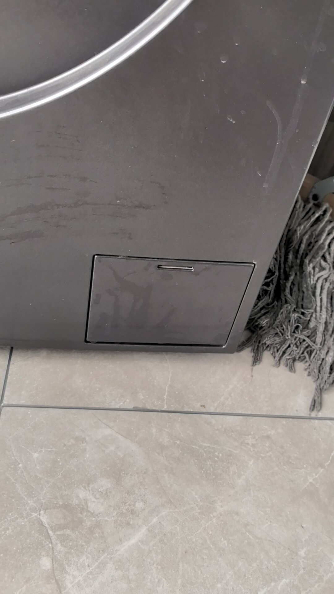 海尔洗衣机排污口清理