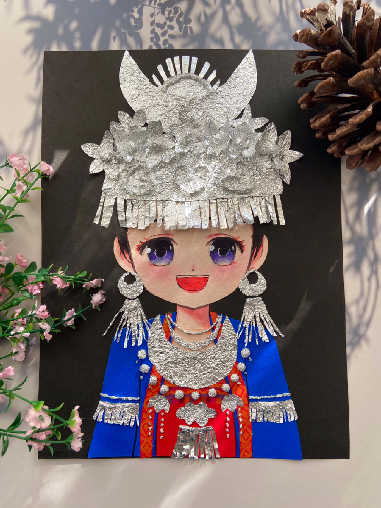 三月三,苗族女孩锡纸剪贴画展示