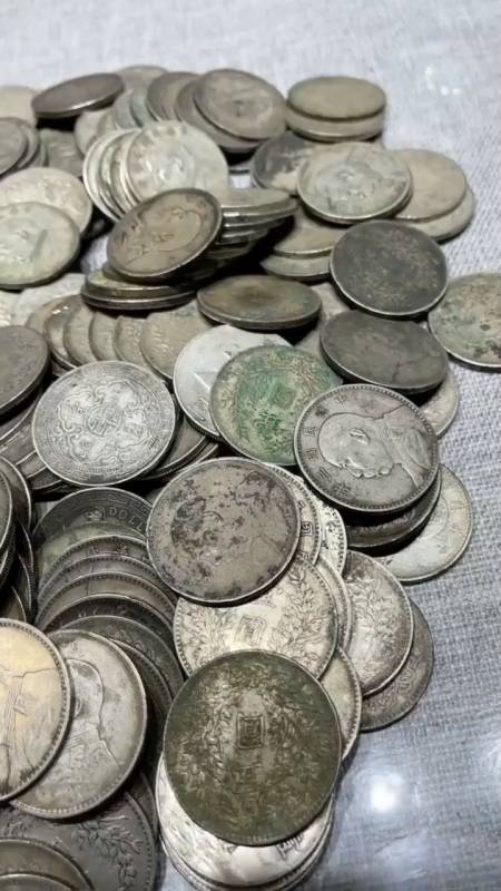 我这一地摊的银元价值能在小县城买房?