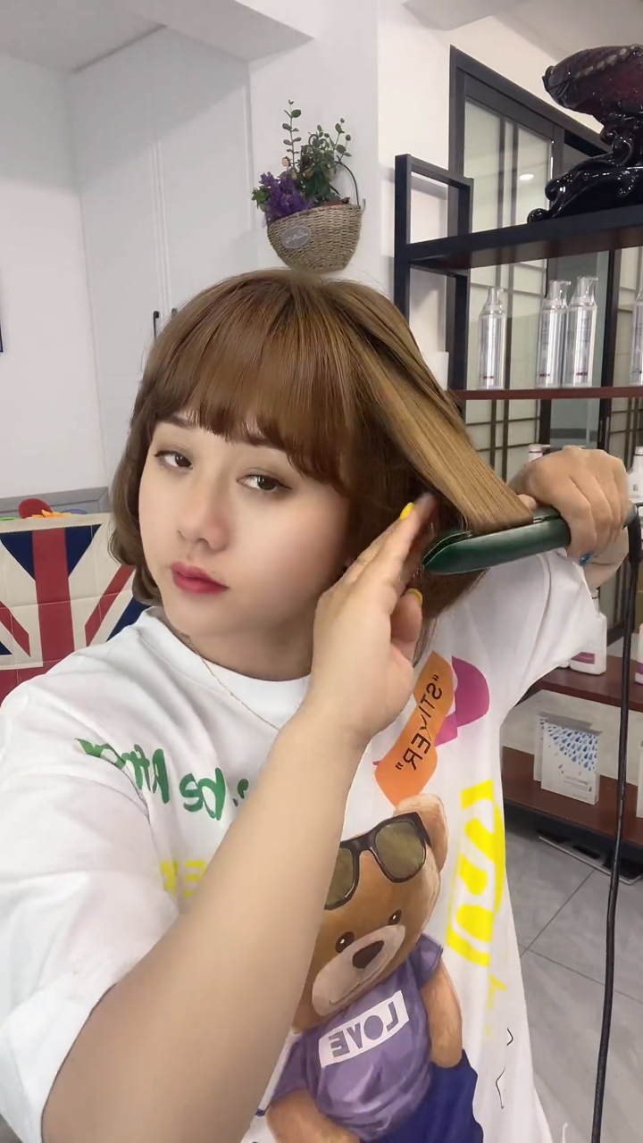 简单一点的夹板造型短发可以这样梳头发