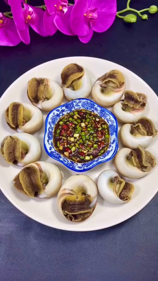 猫眼螺你知道怎么吃吗,这里教会你-度小视