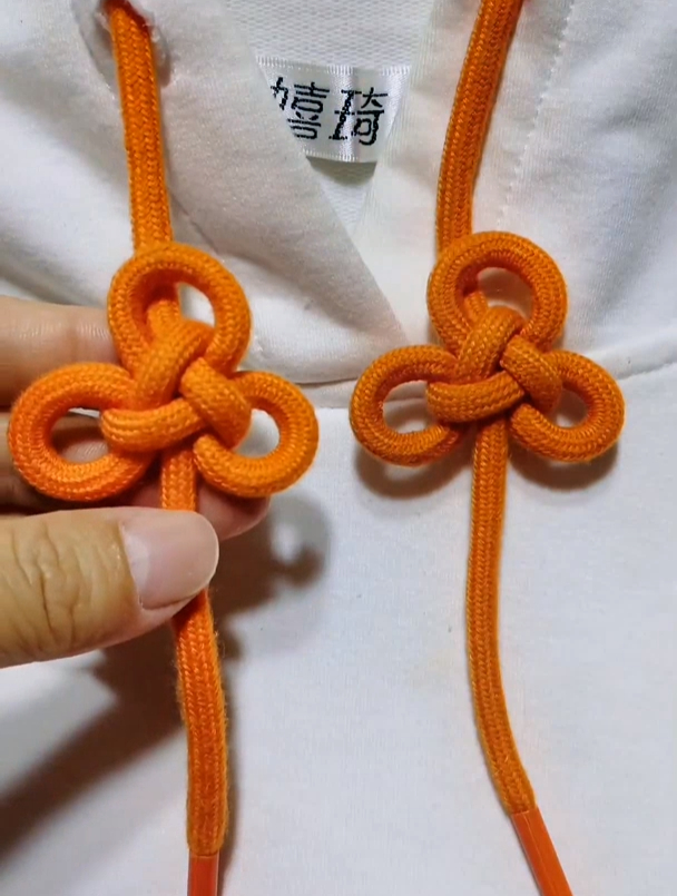 14. 梅花7115慢动作教程来了 卫衣飘绳打结 卫衣绳系法-度小视