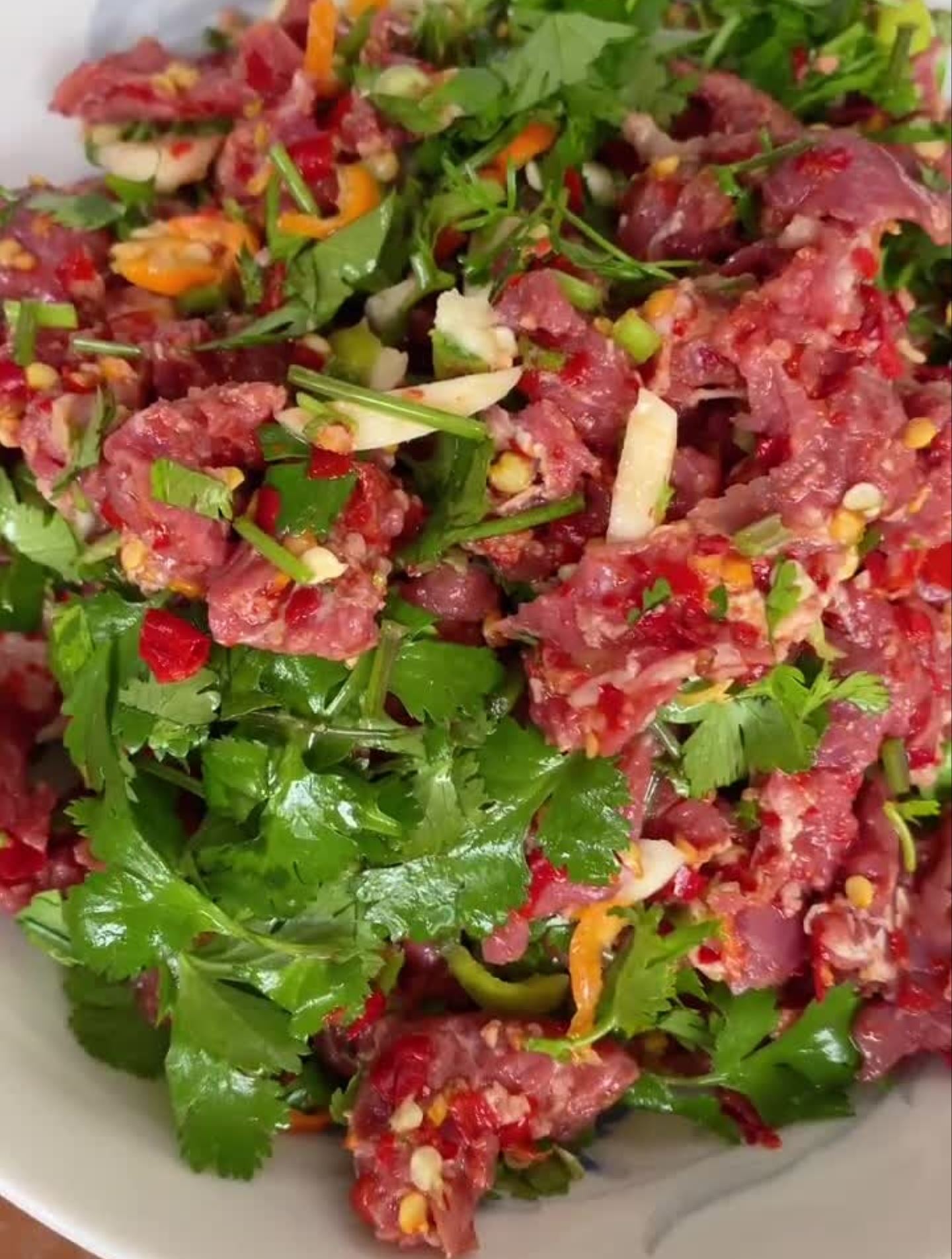 来过来尝尝这个傣味酸牛肉,下酒菜,口水流流