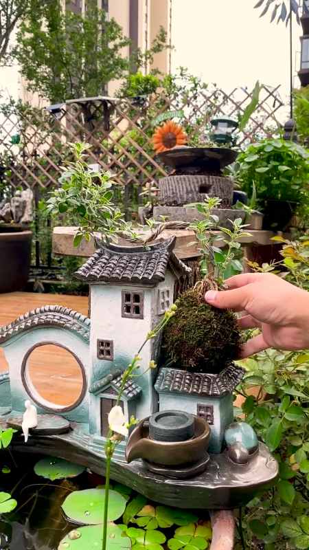 瓦缸配上这个江南水乡流水,整体看起来更有感觉了-度小视