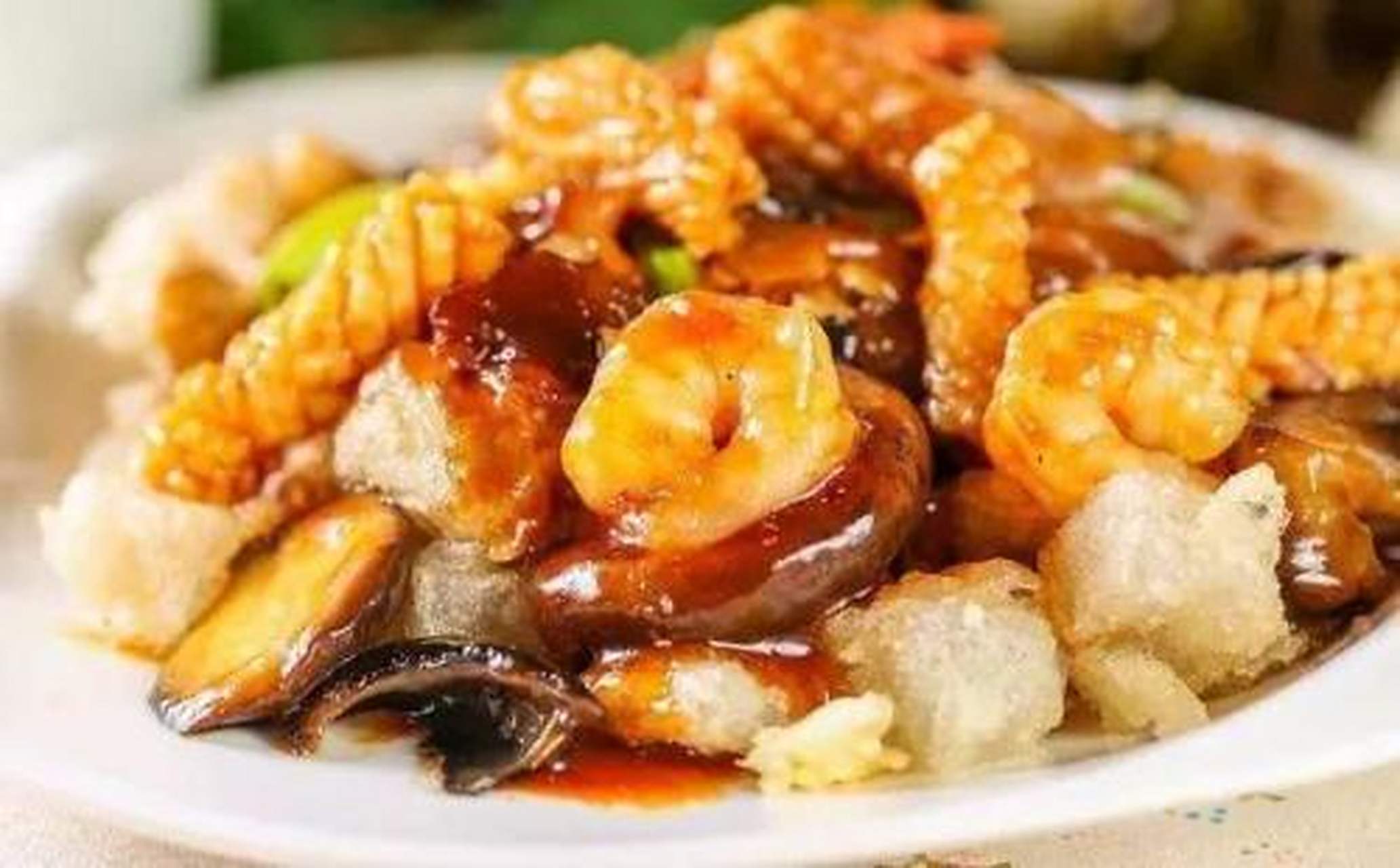 城市身边事#【沈阳美食】海鲜焖子是一种大连小吃,海鲜焖子由地瓜粉