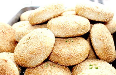 曾经获得过金鼎奖的,河南新乡当地的牛忠喜烧饼