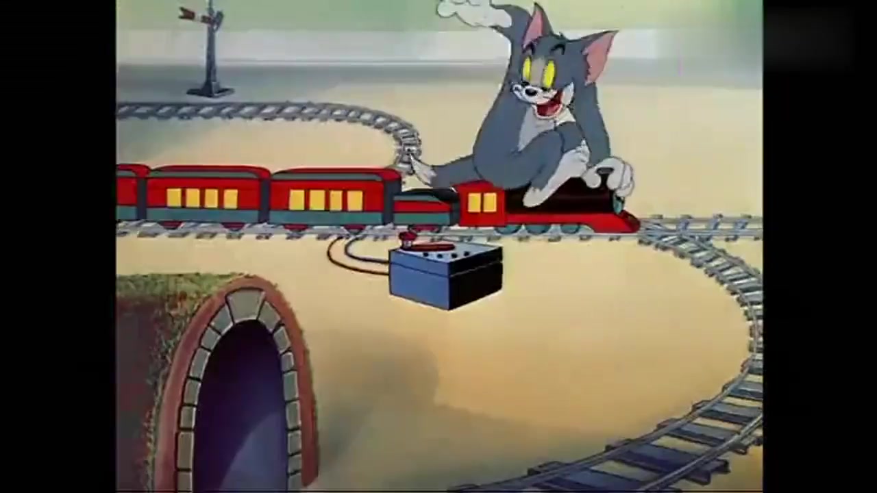 动漫壁纸:汤姆开火车准备碾压杰瑞,金丝雀扔铅球救出杰瑞