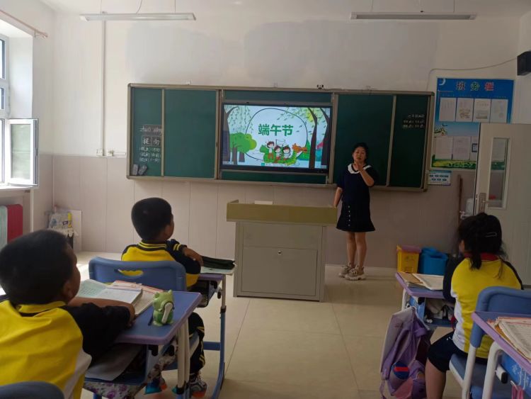 "粽"情端午,乐享安康——塔哈镇中心学校开展迎端午系列活动