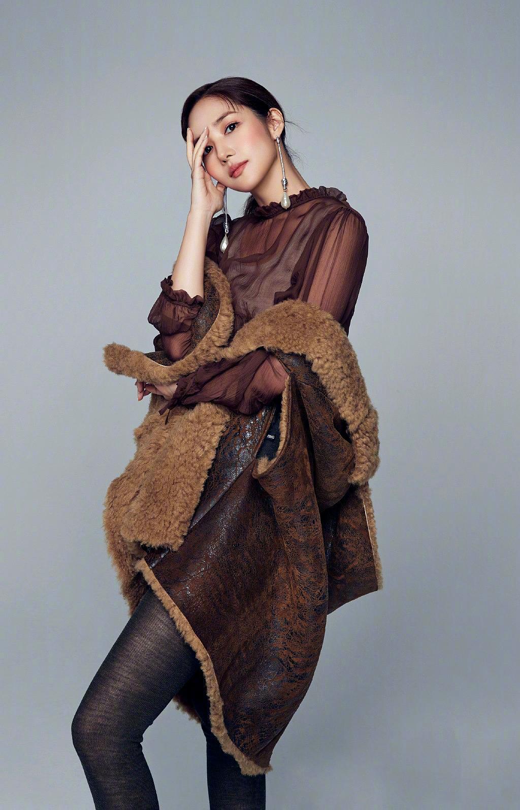 明星写真:集甜美优雅于一身——韩国演员朴敏英