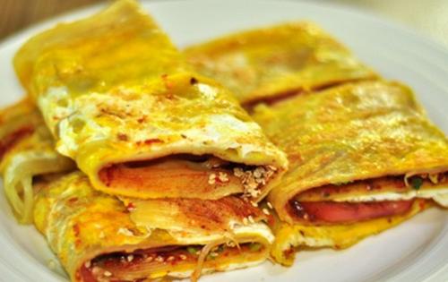 烤冷面的兴起于1999年前后,相传是位于密山市密山镇各学校门口,有碳烤