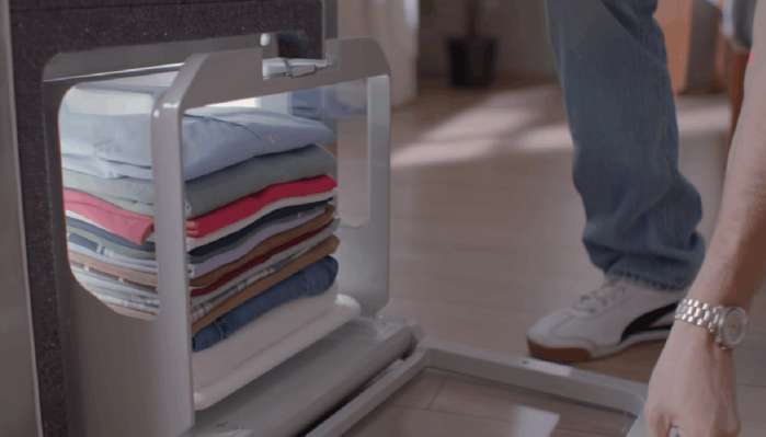 懒癌患者的救星?新型机器人可以自动叠衣服!