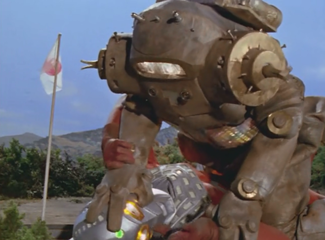 金古桥是佩丹星人制造的宇宙机器人,全身由特殊的金属制成,拥有强大的