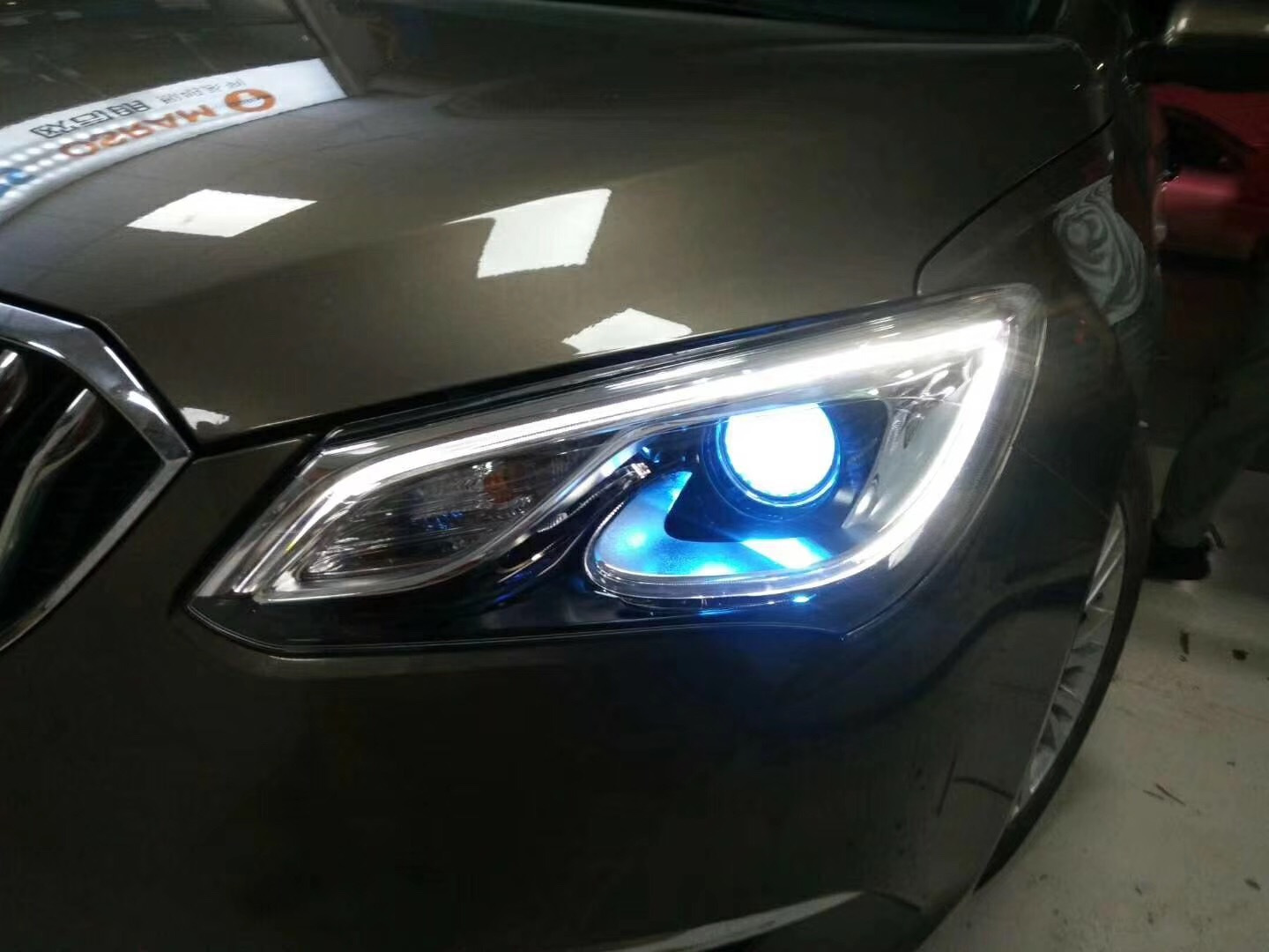 成都改灯 别克英朗改 透镜 氙气大灯改装 升级大灯案例