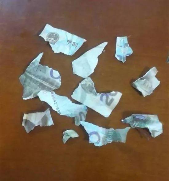 女子撕人民币:我撕自己钱不犯法吧?民警:真犯法!