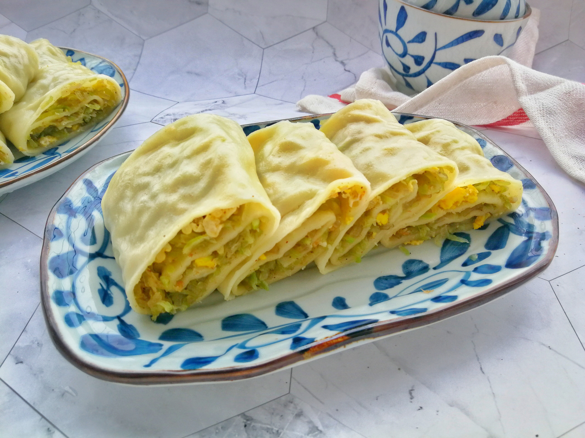 早餐吃萝卜卷,无需发面,皮薄馅儿多,比馒头包子简单多了