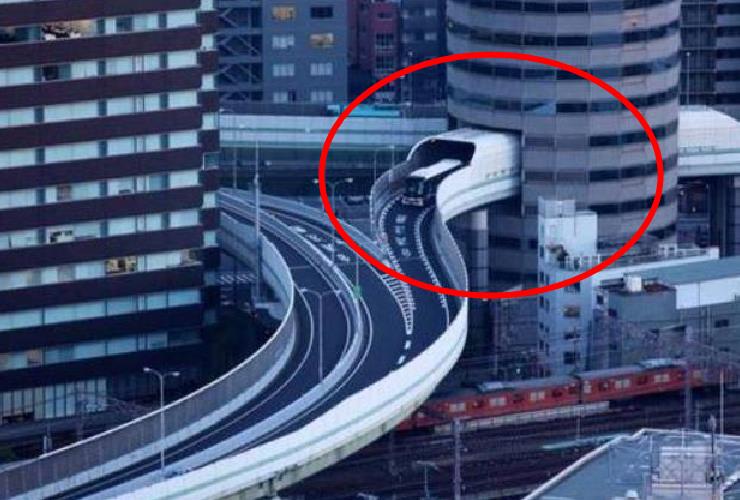 世界上最牛钉子户:高速公路被迫从高楼中穿过,还得给房东交租金