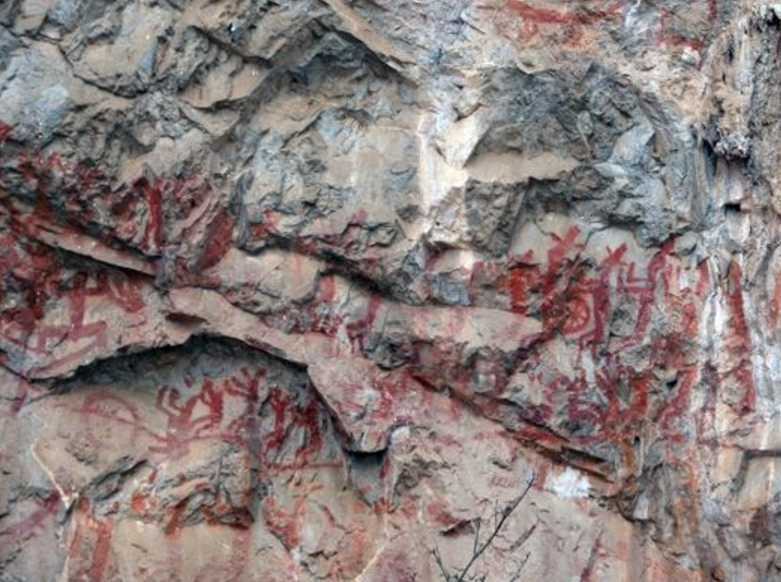 人面像是将军崖岩画中最具特征,最值得注意的图像