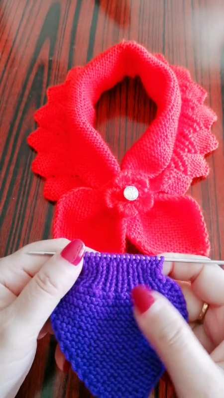 蝴蝶结小围巾的织法起针开头正面两边各加一针反面正常织织到有针就不