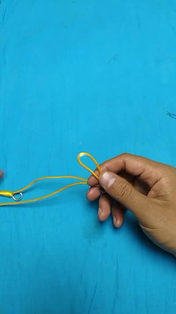 双钩子线放缠绕的打结方法