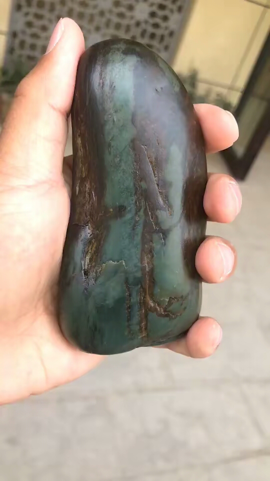 红皮满眼沙枣青手把件