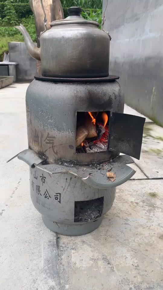 煤气瓶制作柴火灶图片